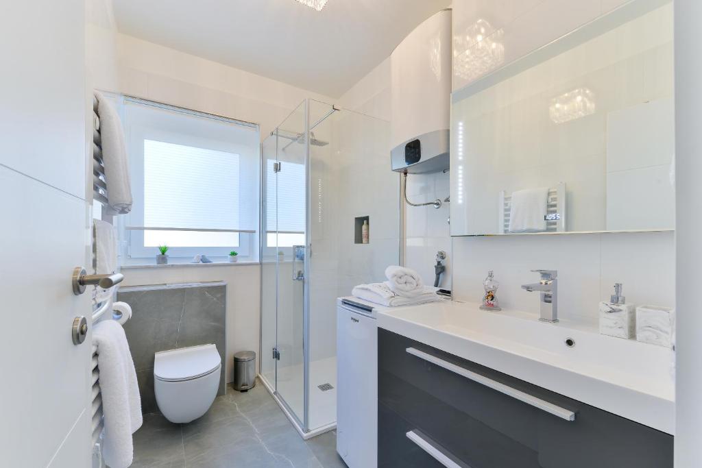 Kúpeľňa v ubytovaní PIA Apartment