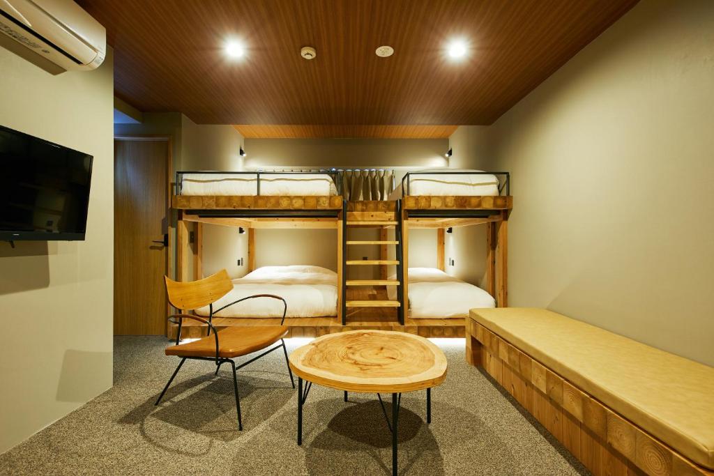 Postel nebo postele na pokoji v ubytování mizuka Daimyo 7 - unmanned hotel -