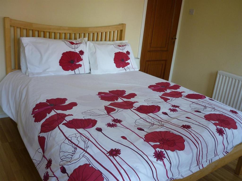 Postel nebo postele na pokoji v ubytování Gayton Bed & Breakfast