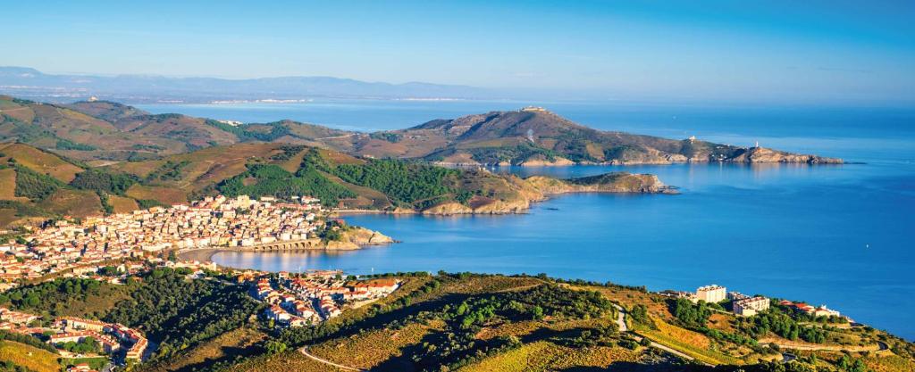 an aerial view of a town in the middle of the ocean at WEEK END EVASION A BANYULS SUR MER DANS PYRENEES ORIENTALES in Banyuls-sur-Mer