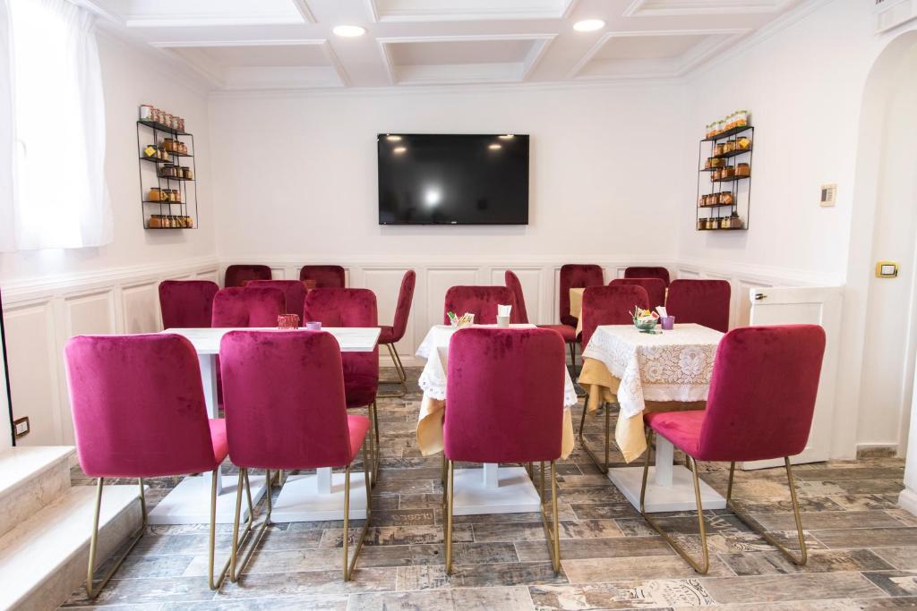TV a/nebo společenská místnost v ubytování Hotel Cinquantatre