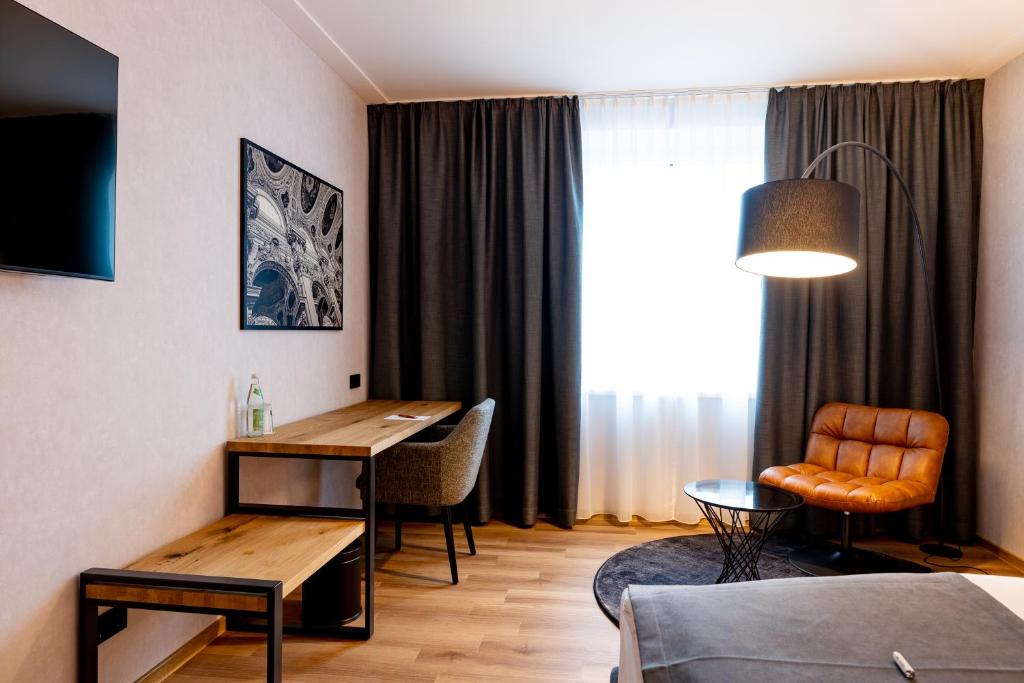 TV a/nebo společenská místnost v ubytování mk hotel passau