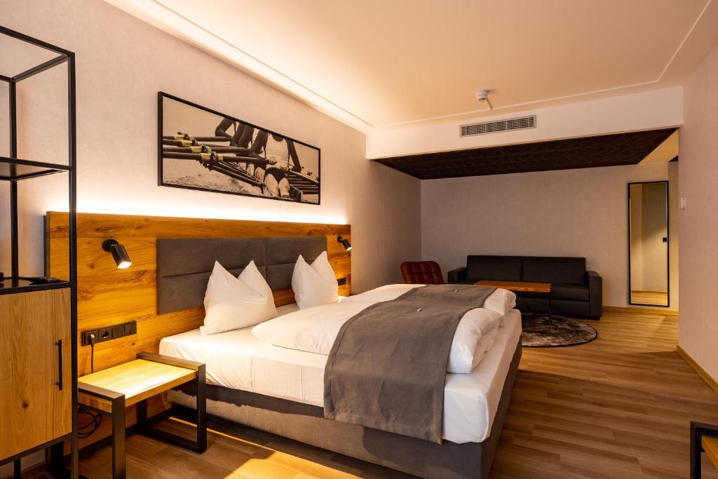 Postel nebo postele na pokoji v ubytování mk hotel passau