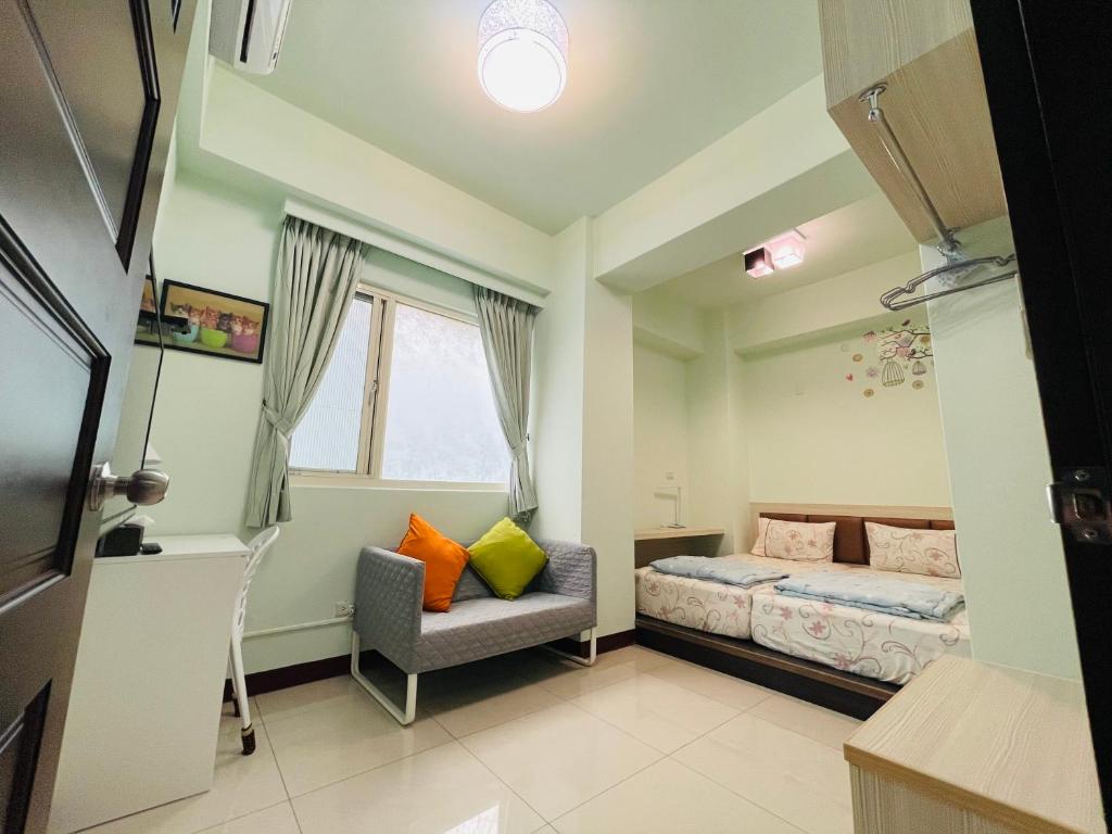 Postel nebo postele na pokoji v ubytování Zucuo Homestay