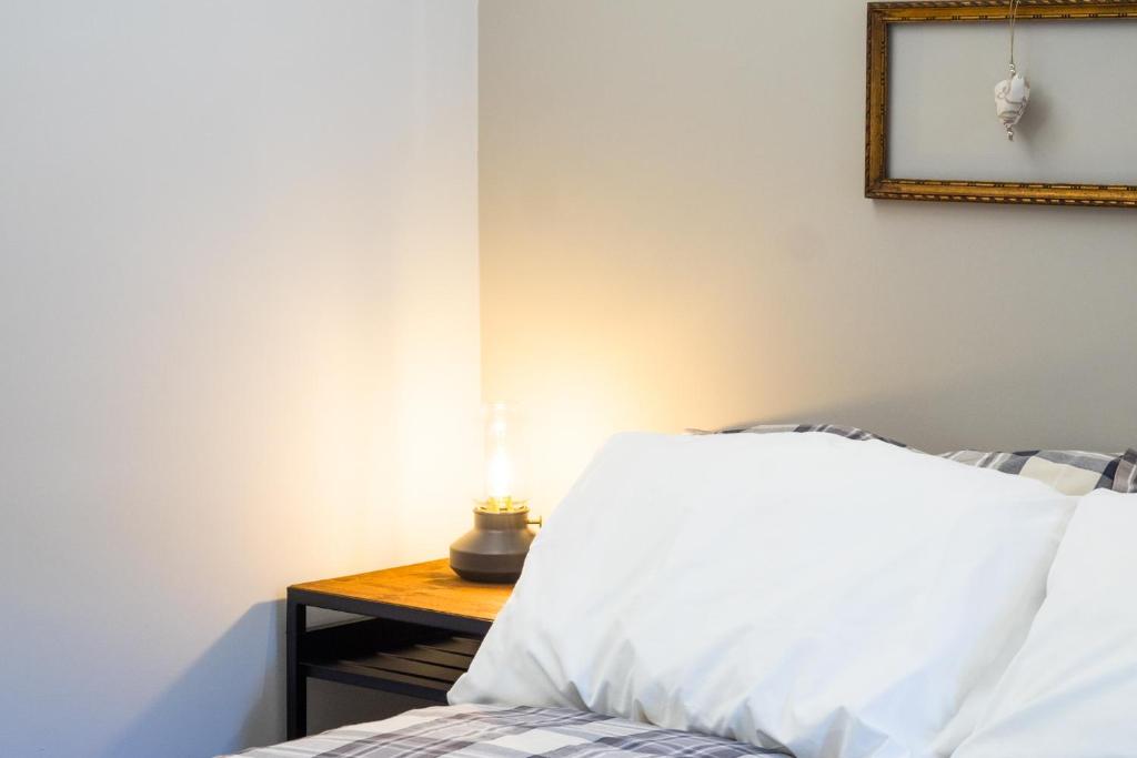 Postel nebo postele na pokoji v ubytování Locanda Vecchio Cipresso