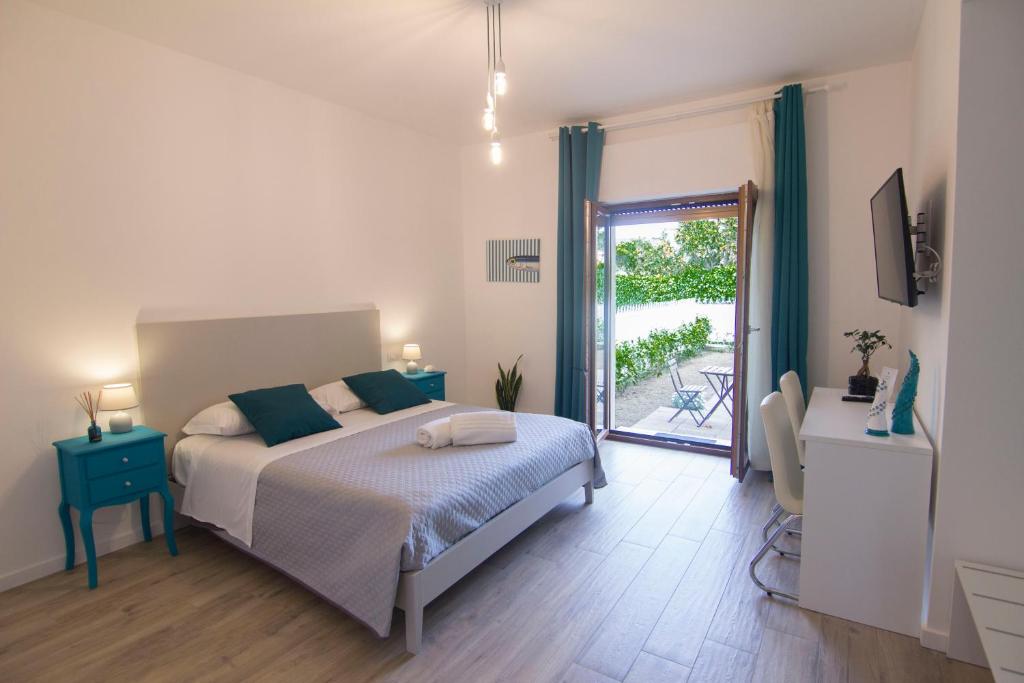 A bed or beds in a room at Maison Ligea