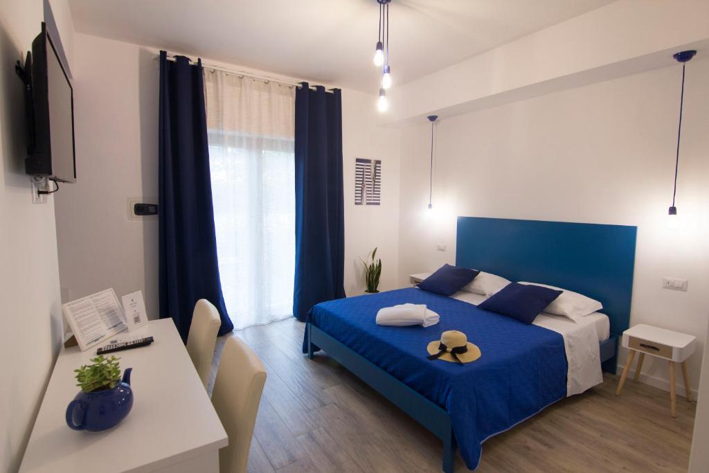 A bed or beds in a room at Maison Ligea