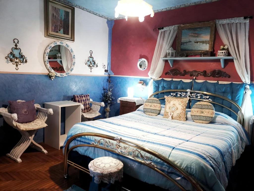 Posteľ alebo postele v izbe v ubytovaní Art B&B La Casa del Pittore