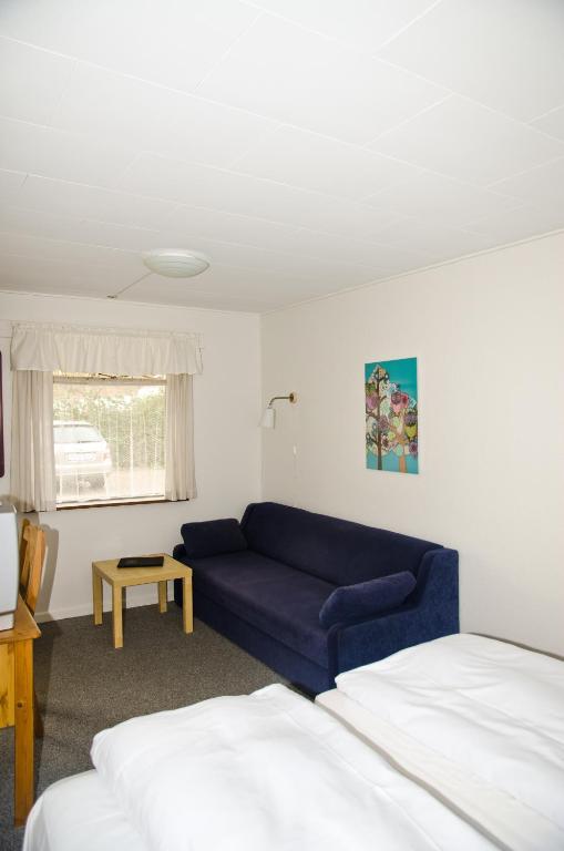 Postel nebo postele na pokoji v ubytování Tylstrup Kro og Motel