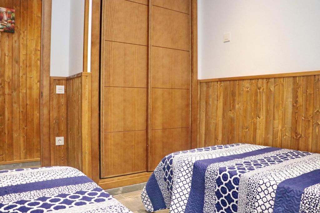 Postel nebo postele na pokoji v ubytování Chalet Brenes Sol