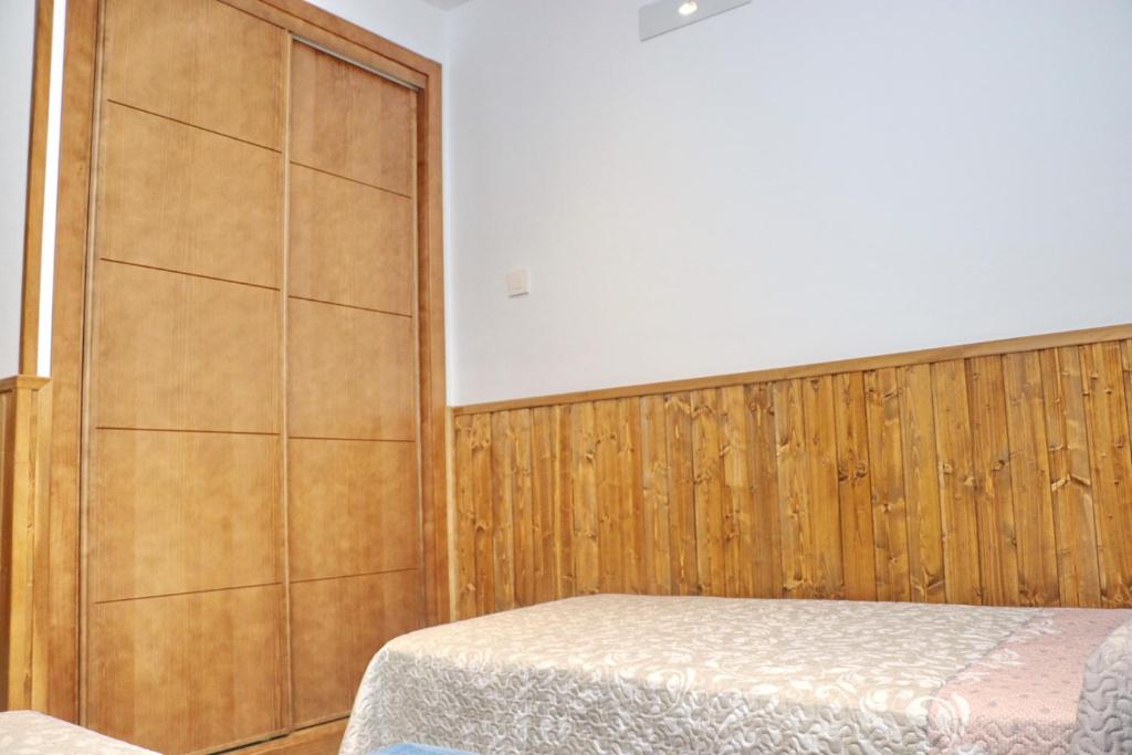 Postel nebo postele na pokoji v ubytování Chalet Brenes Sol