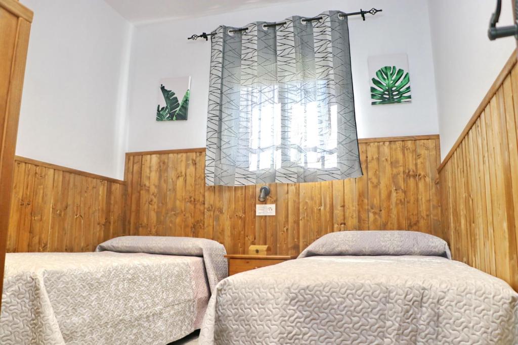 Postel nebo postele na pokoji v ubytování Chalet Brenes Sol