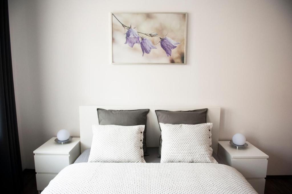 Postel nebo postele na pokoji v ubytování R&J apartmány