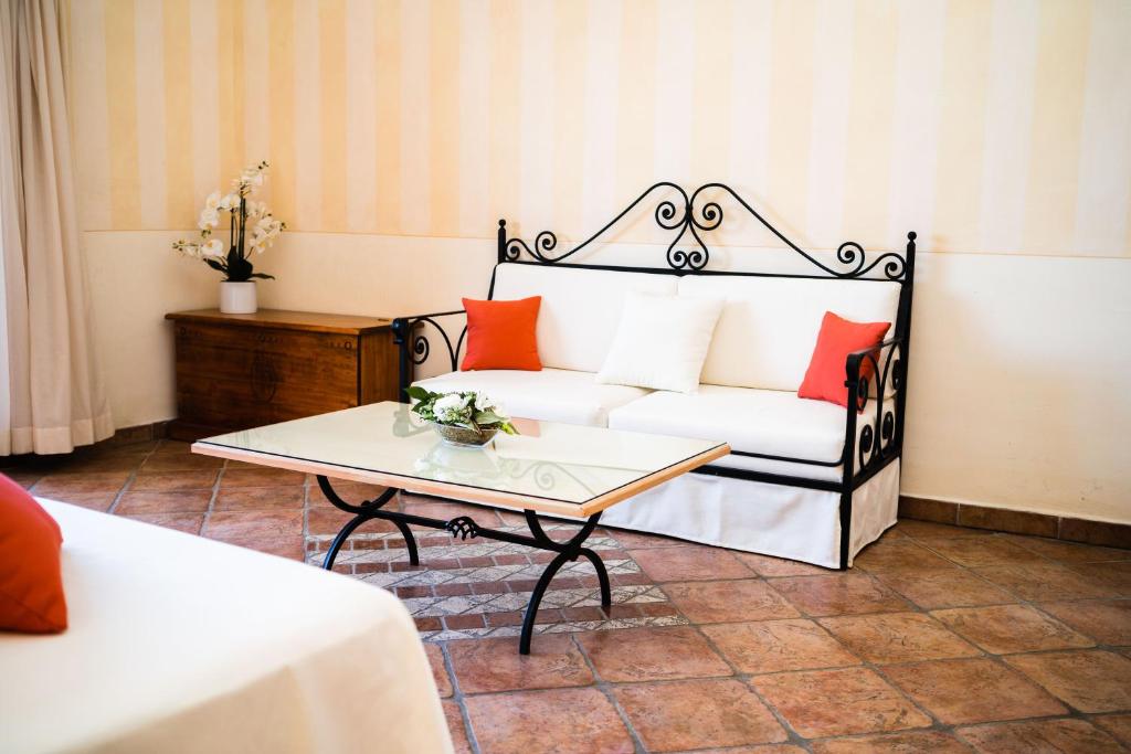 Postel nebo postele na pokoji v ubytování LH Hotel Pozzo Sacro