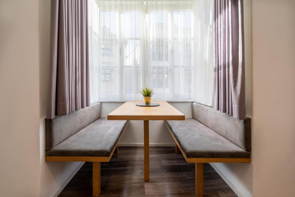 Posedenie v ubytovaní Kaiser Max Design Appartements