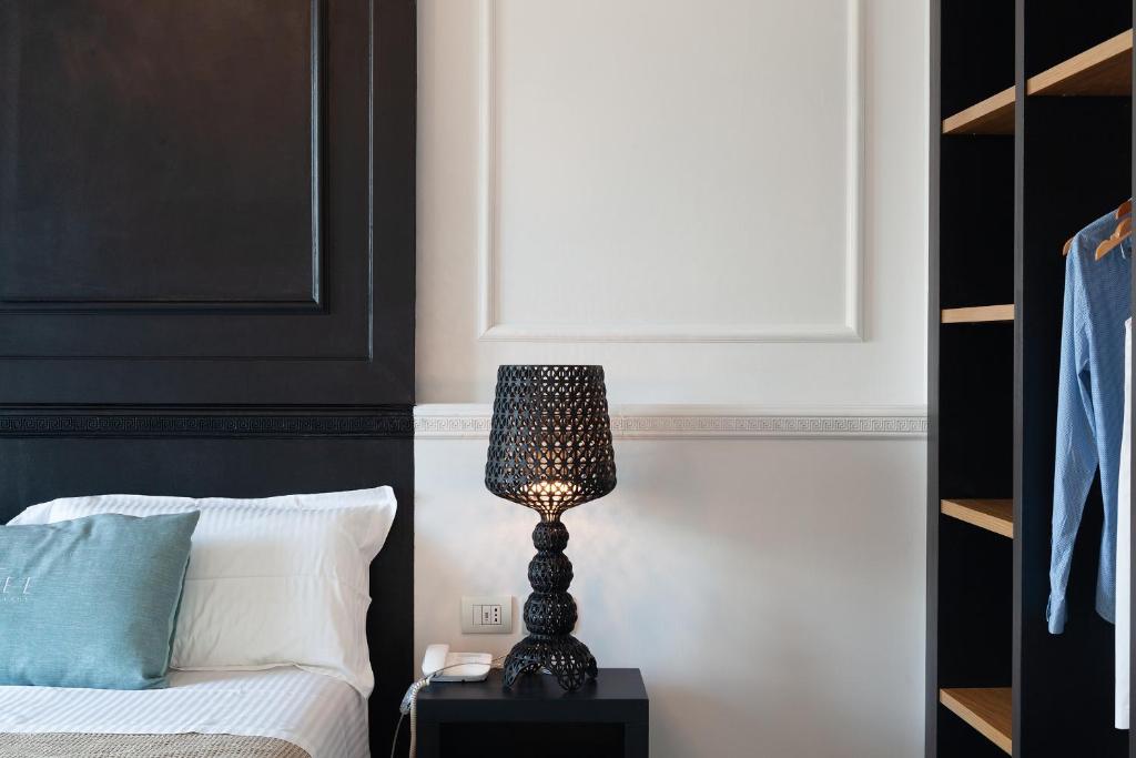 Posteľ alebo postele v izbe v ubytovaní Coclee Suite Palace