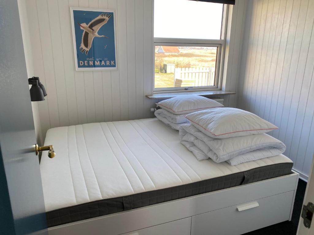 Postel nebo postele na pokoji v ubytování Aa Strand Camping