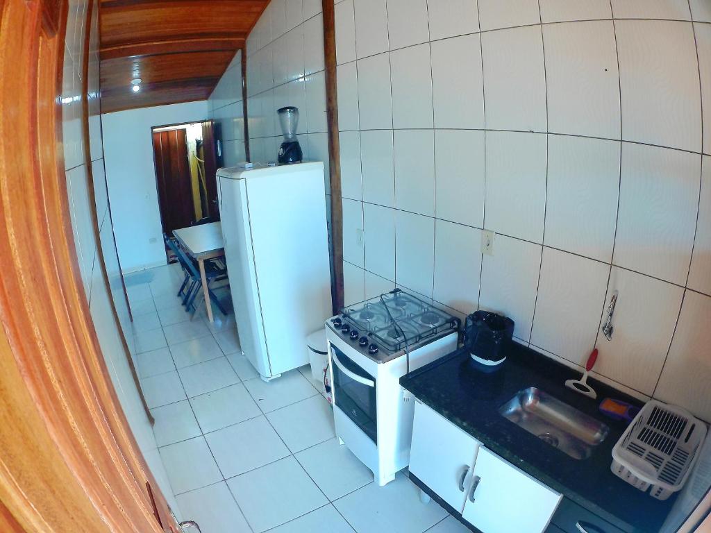 Kuchyň nebo kuchyňský kout v ubytování Jambeiro na praia