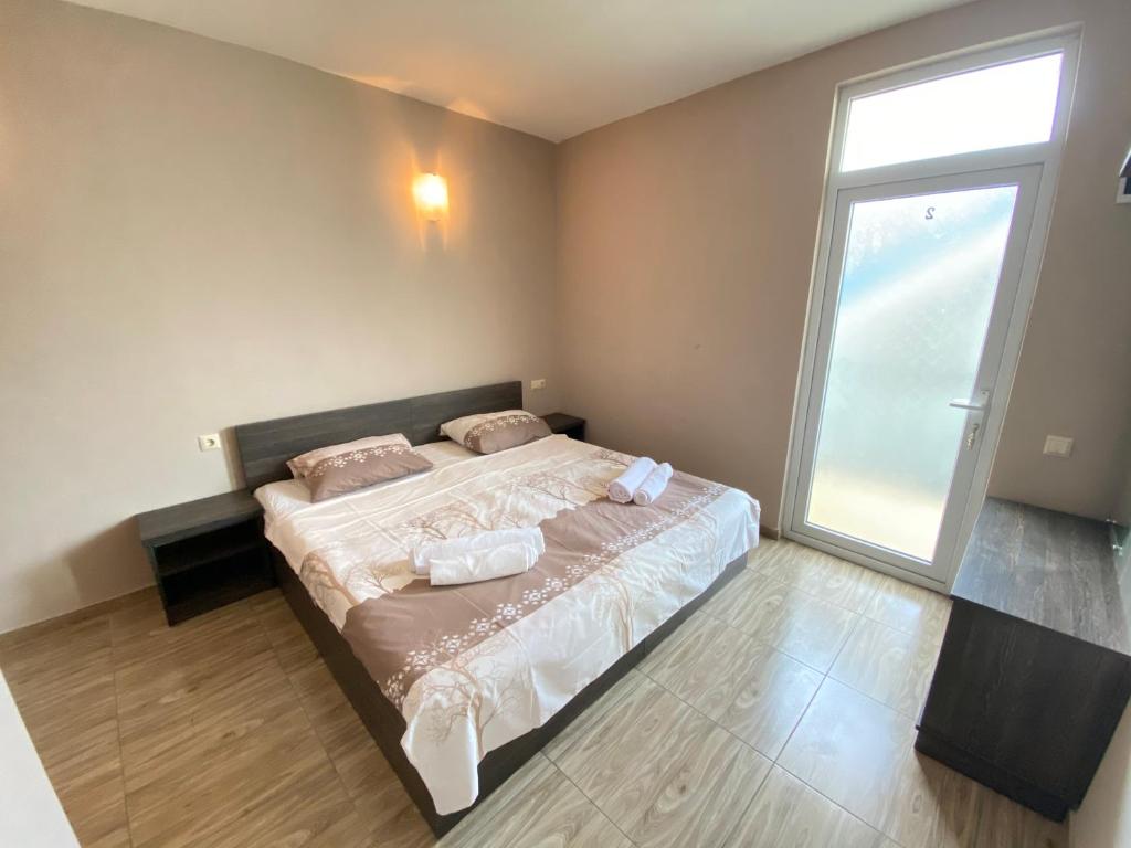 Ένα ή περισσότερα κρεβάτια σε δωμάτιο στο Hotel Charli