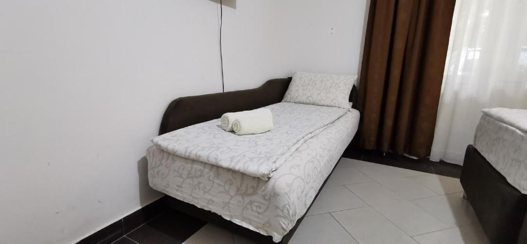 Postel nebo postele na pokoji v ubytování Apartments Banjica