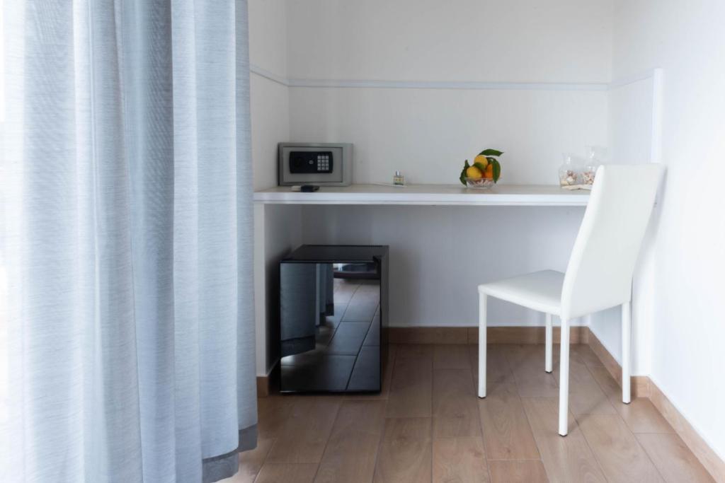 Kuchyň nebo kuchyňský kout v ubytování Sirentum Rooms