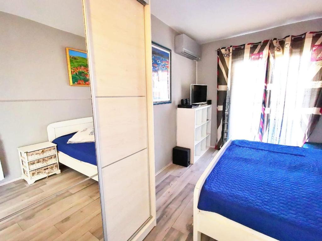 Posteľ alebo postele v izbe v ubytovaní Jelsa View Apartments