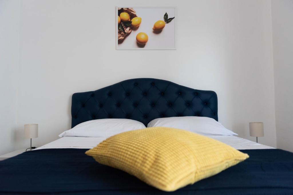 Postel nebo postele na pokoji v ubytování Sirentum Rooms