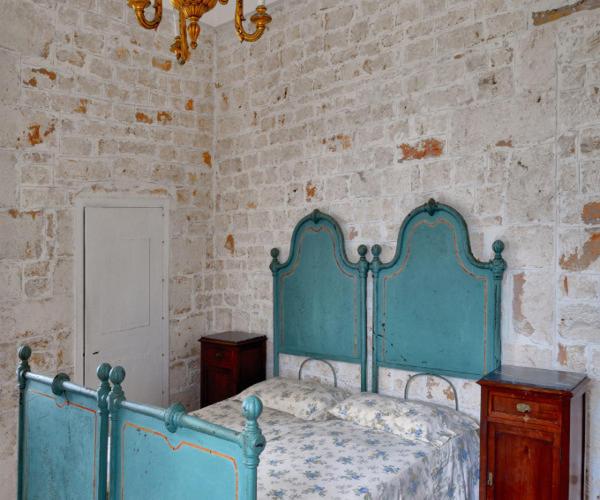 Łóżko lub łóżka w pokoju w obiekcie Agriturismo Antonelli Piangevino