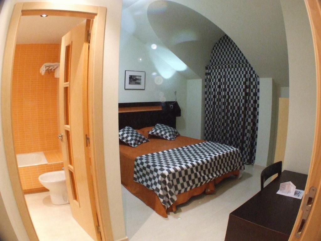 A bed or beds in a room at La Traina