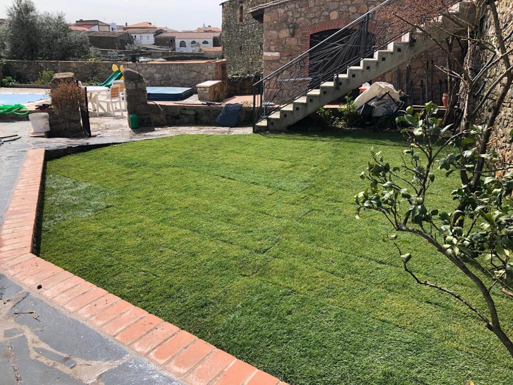 Vonkajšia záhrada v ubytovaní Casa rural La Tahona del abuelo TR CC 00344
