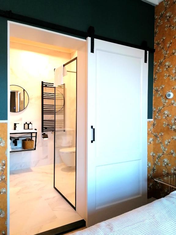 Postel nebo postele na pokoji v ubytování B&B De Stadssingel