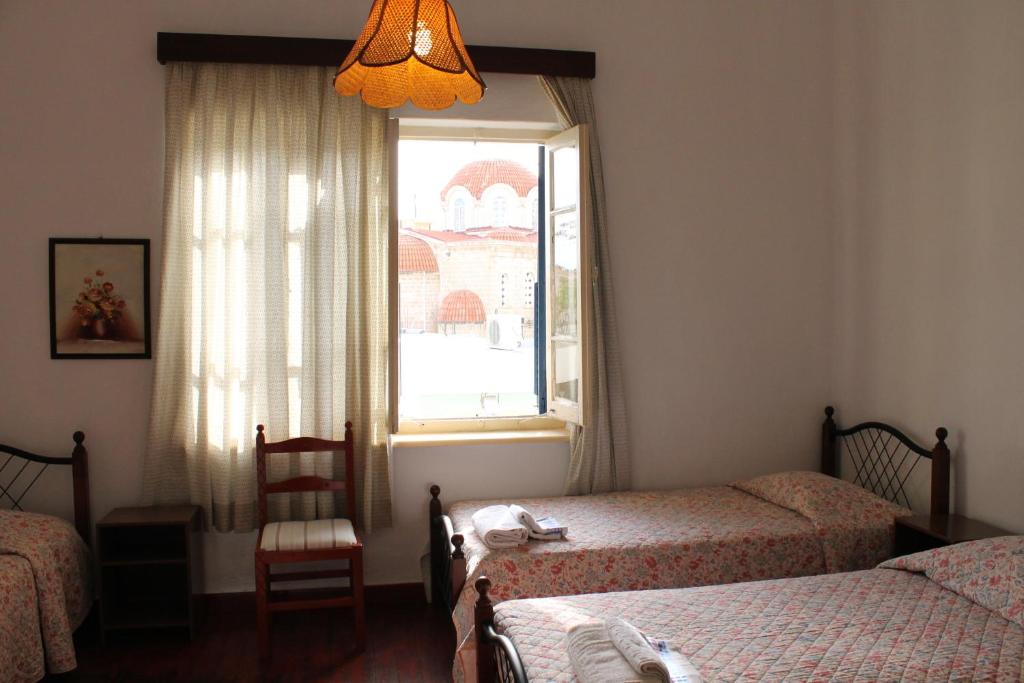 Postel nebo postele na pokoji v ubytování Trianon