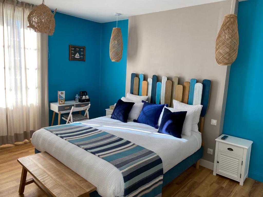 Posteľ alebo postele v izbe v ubytovaní La Rochelle et l'Aunis