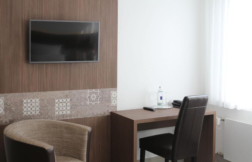 TV a/nebo společenská místnost v ubytování Hotel Landgasthof Gemmer