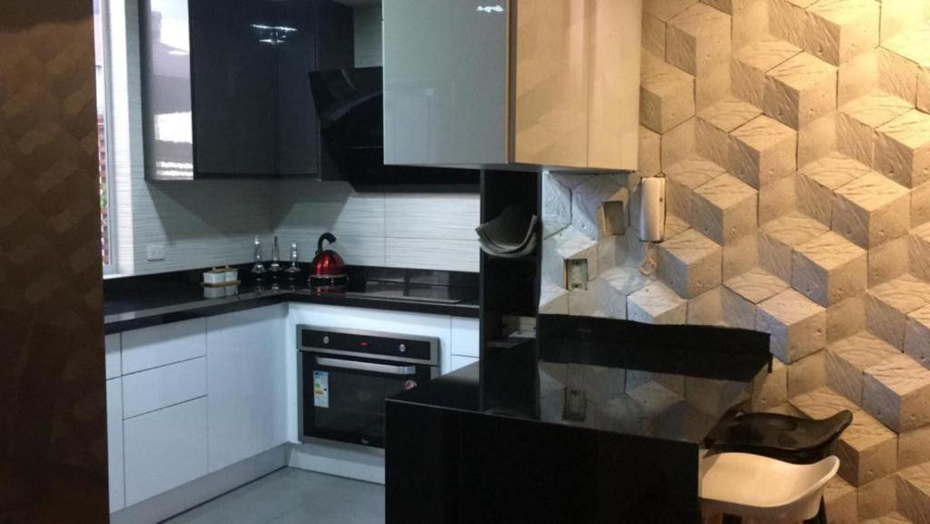Kuchyň nebo kuchyňský kout v ubytování Misuitehotel La Carolina Quito