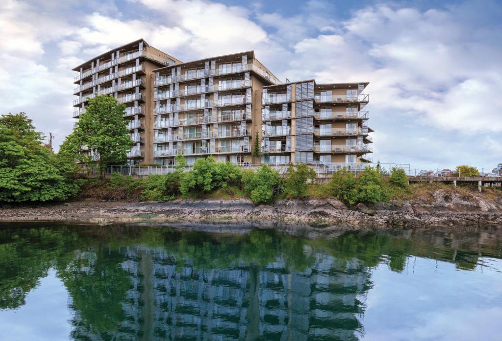 a large building next to a body of water at WorldMark Victoria in Victoria
