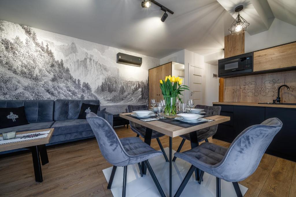 Kuchyňa alebo kuchynka v ubytovaní APARTAMENT BIAŁKA TATRZAŃSKA TATRY SUN&SNOW