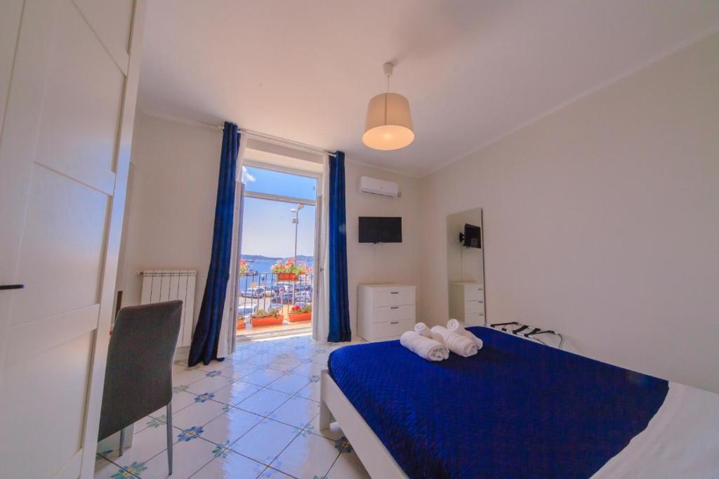 Posteľ alebo postele v izbe v ubytovaní Casa Adele b&b