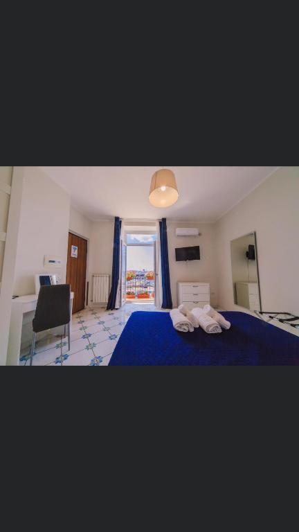 Posteľ alebo postele v izbe v ubytovaní Casa Adele b&b