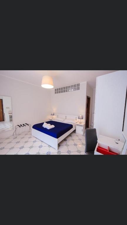 Posteľ alebo postele v izbe v ubytovaní Casa Adele b&b