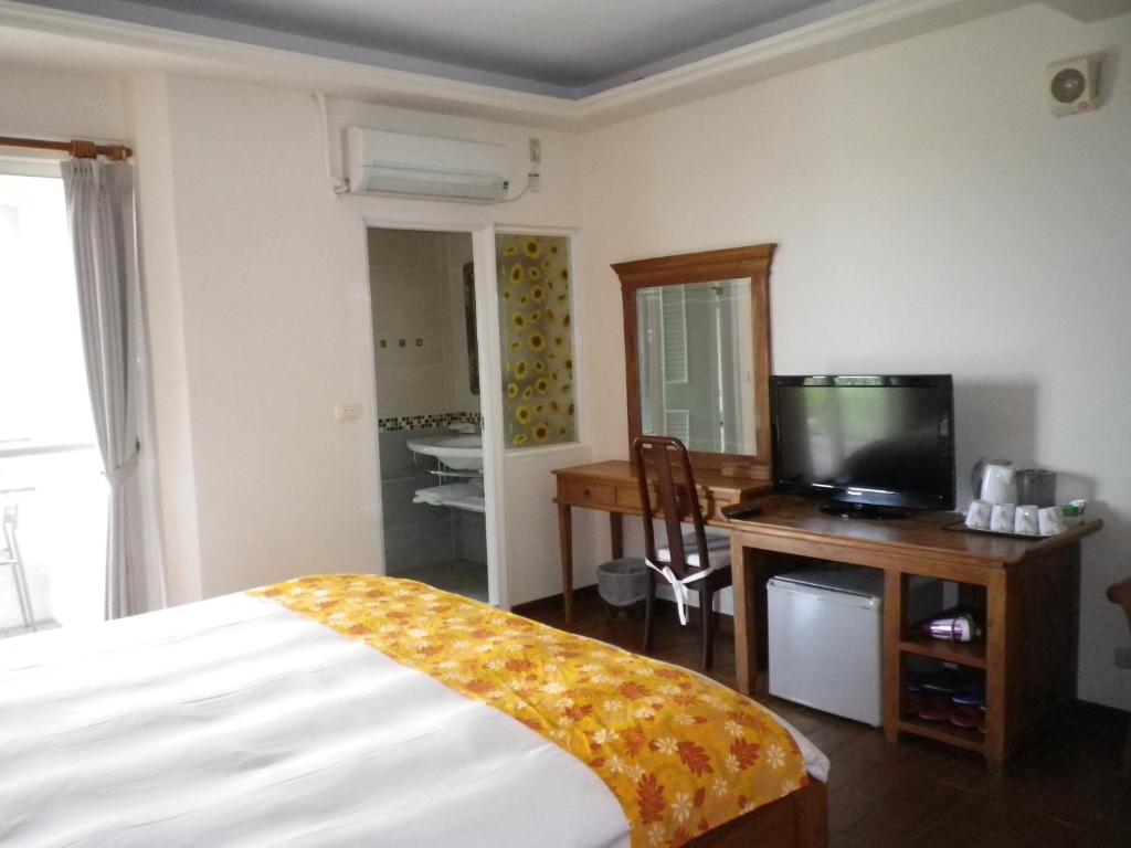 Postel nebo postele na pokoji v ubytování Mamalulu Hostel