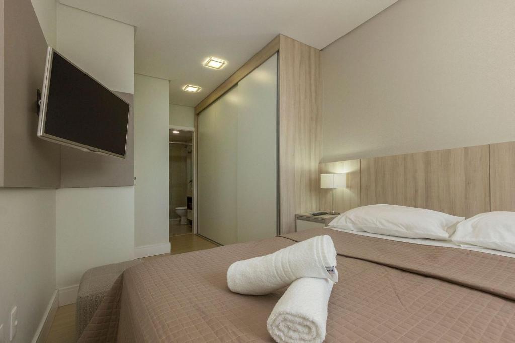  Boulevard Bombinhas 207 - Apto 3 dorms 6 pessoas Condomínio com Piscina Climatizada e Jacuzzi