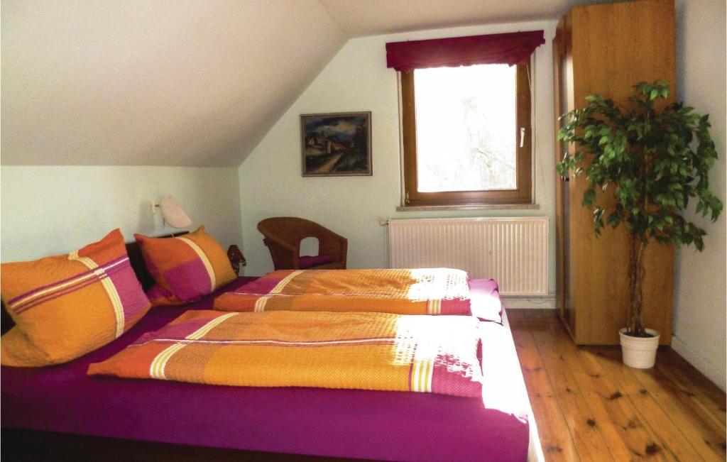 Postel nebo postele na pokoji v ubytování Holiday Home Zechin- Friedrichsaue Ef-1750