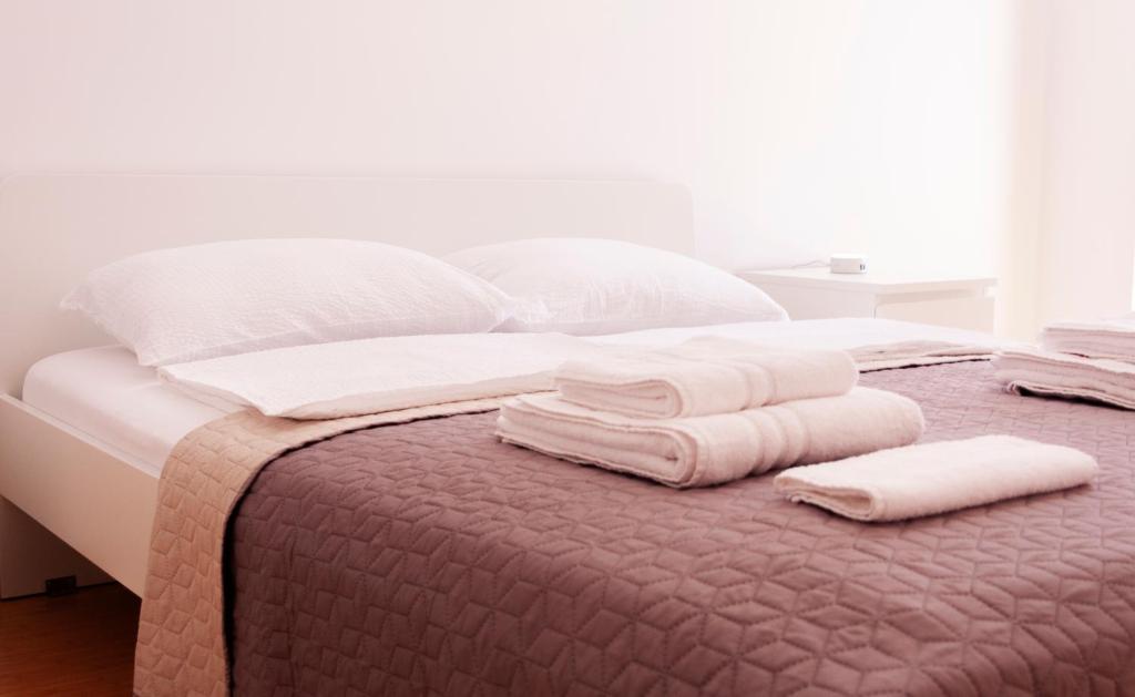 Postel nebo postele na pokoji v ubytování Lux Family Apartment Vidanovic