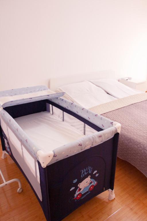 Postel nebo postele na pokoji v ubytování Lux Family Apartment Vidanovic
