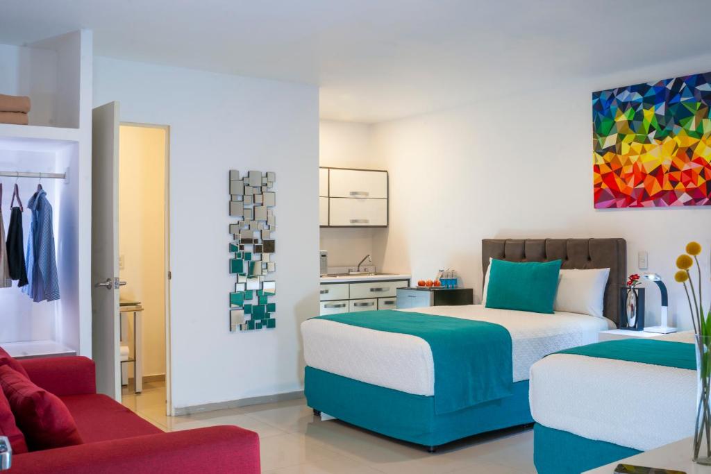 Postel nebo postele na pokoji v ubytování Container Inn Hotel Aeropuerto