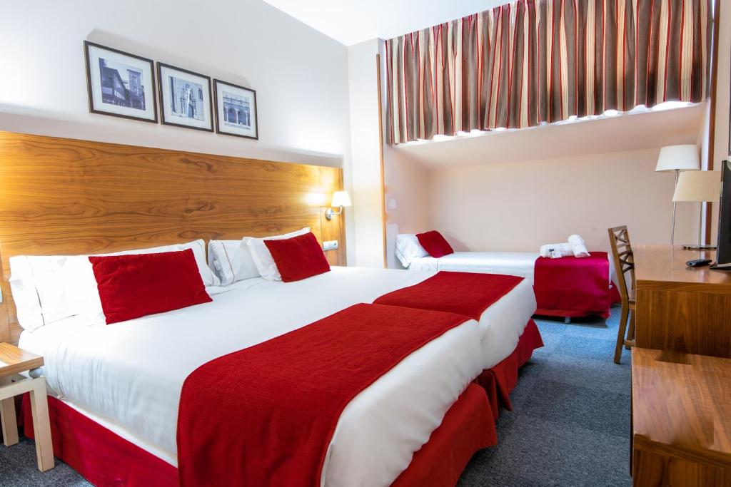 Posteľ alebo postele v izbe v ubytovaní Hospedium Hotel Casino Del Tormes