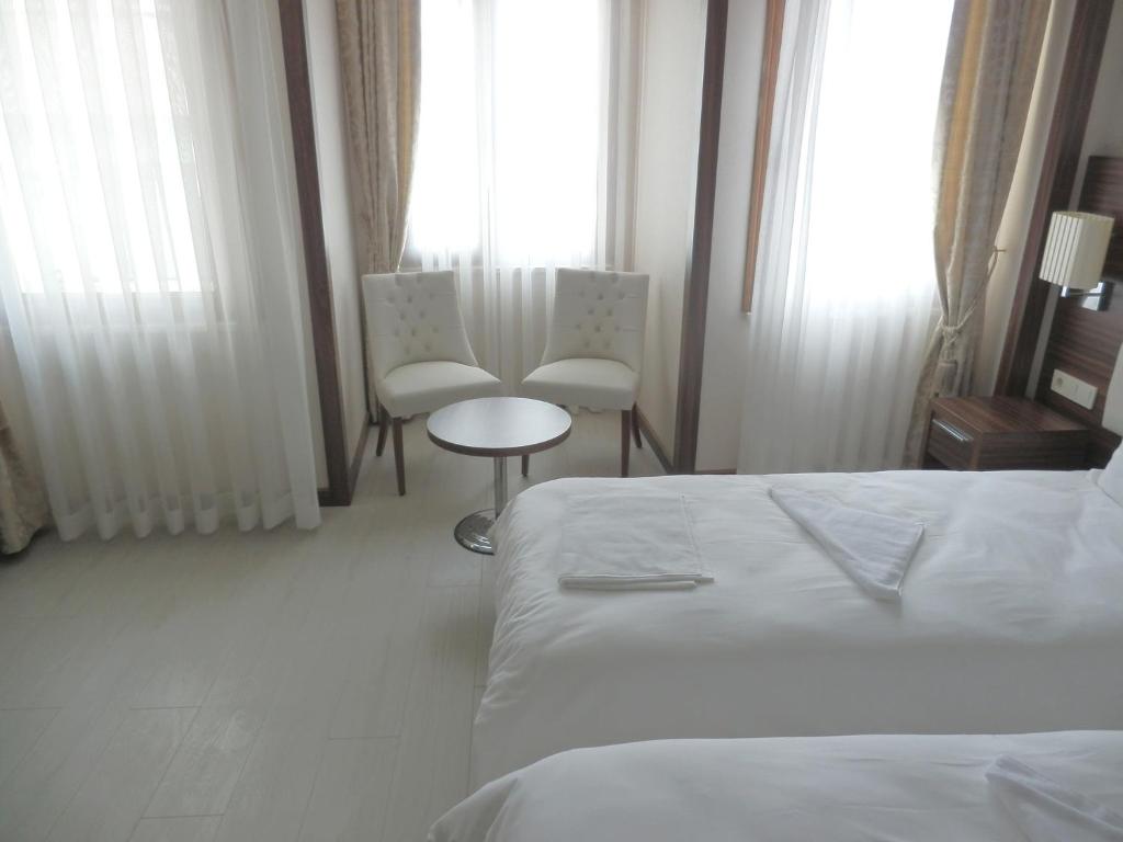 Postel nebo postele na pokoji v ubytování New House