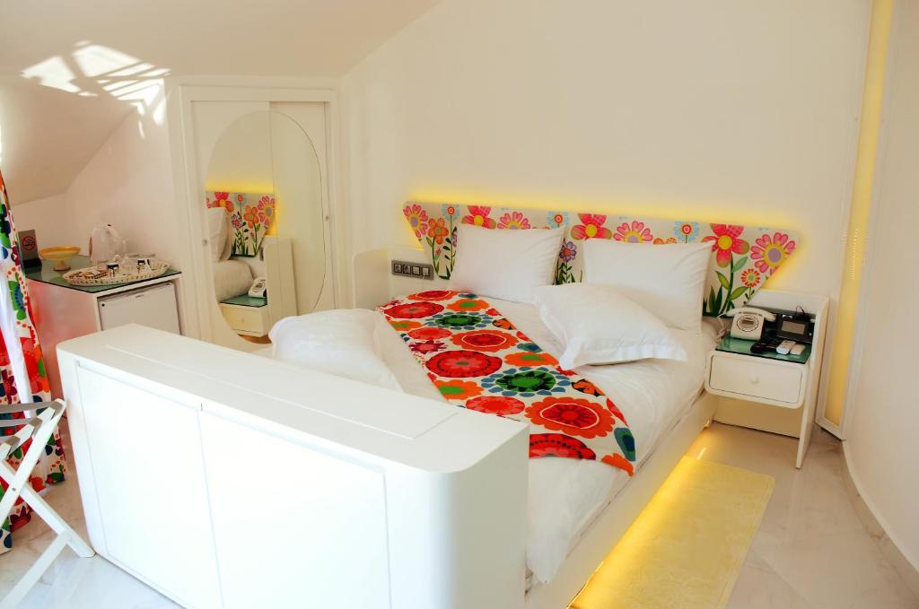 Postel nebo postele na pokoji v ubytování Ata Park Hotel