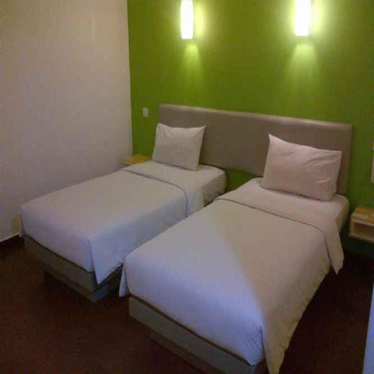 Postel nebo postele na pokoji v ubytování Amaris Hotel Thamrin City